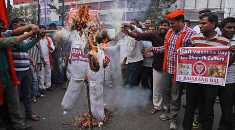 Right-winged Hindu nationalist Bajrang Dal activists burn an effigy symbolizing the Valentine's Day during a protest in Hyderabad. (AP)