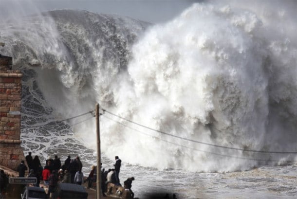 PHOTOS: In Portugal, the waves get a bit too close for comfort | The