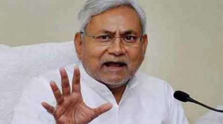 In an embarrassment for Nitish Kumar, a fugitive murder accused presided over his election rally and was arrested later, said police.