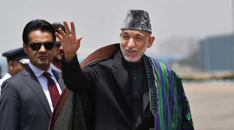 Afghanistan President hamid Karzai lands in New Delhi for Modi's swearing-in ceremony. (AP)