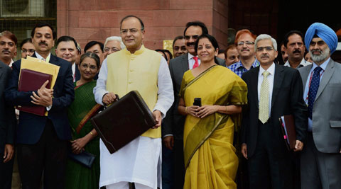 Union Finance Minister Arun Jaitley with MOS for Finance Nirmala Sitharaman and officials outside Finance Ministry. (Source: PTI)