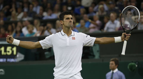 Djokovic celebrates after defeating France's Jo-Wilfried Tsonga on Monday. (Source: AP)
