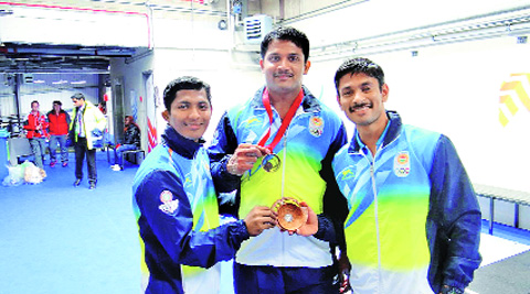 (From left) Ganesh Mali, Chandrakant Mali and Omkar Otari with their bronze medals at the Glasgow Games. Source: Express Photo