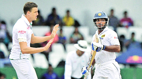 Sangakkara scored his 50th Test half-century, before Morkel snapped him. Source: AP