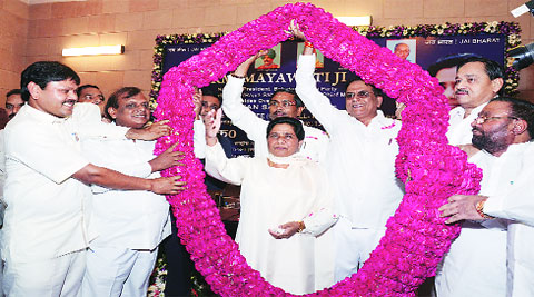 BSP chief Mayawati being welcomed by party senior leaders at a meeting held at the party head office in Lucknow on Saturday.  (Source: Express photo by Vishal Srivastav)