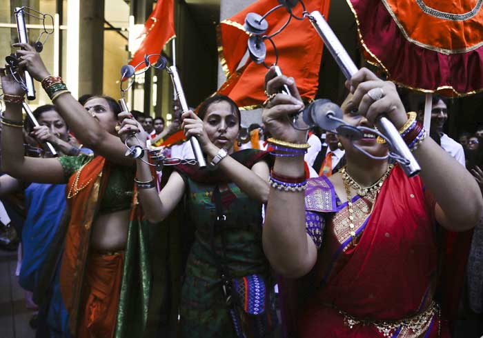 Dancers with an Indian cultural group perform outside Madison Square Garden in preparation for an appearance by Indian Prime Minister Narendra Modi on Sunday, Sept. 28, 2014, in New York. (Source: PTI)