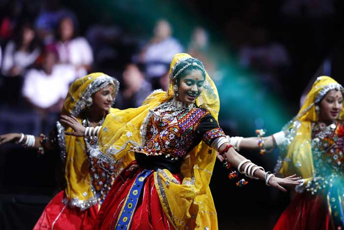 Traditional Gujarati dancers perform during a reception by the Indian community in honor of Indian Prime Minister Narendra Modi's visit to the United States at Madison Square Garden, Sunday, Sept. 28, 2014, in New York. (Source: PTI)