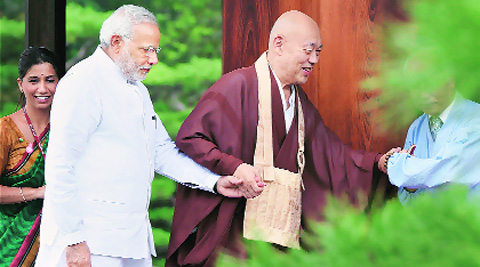 ‘I’m Modi and you are Mori’: This is how Prime Minister Narendra Modi charmed the 83-year-old  head priest Yasu Nagamori (left) of Kinkakuji (Golden  Pavilion) —  an ancient 14th century Buddhist temple — in Kyoto on Sunday. (Source: PTI)