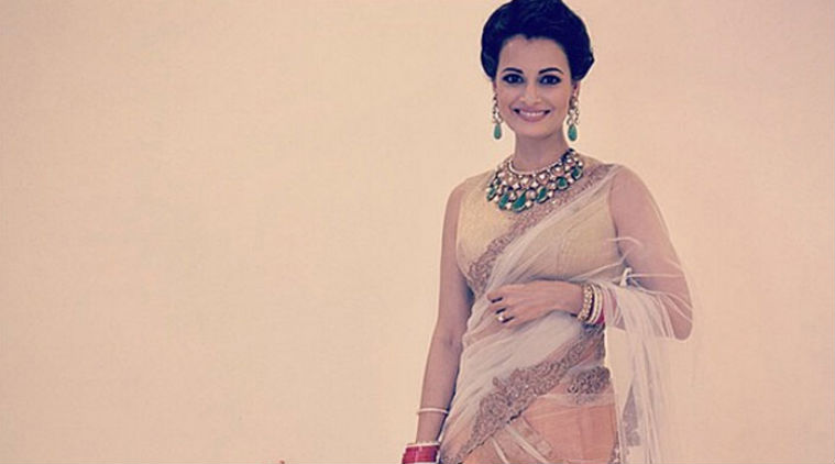 Dia Mirza was the epitome of elegance and beauty as she donned a stunning peach-gold Shantanu and Nikhil lehenga. 