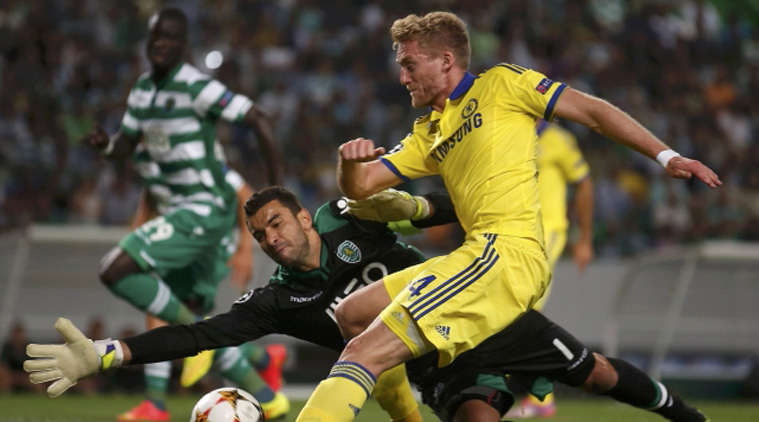 Sporting Lisbon's goalkeeper Rui Patricio saves a shot from Chelsea's Andre Schurrle during their Champions League Group G soccer(Source: Reuters)