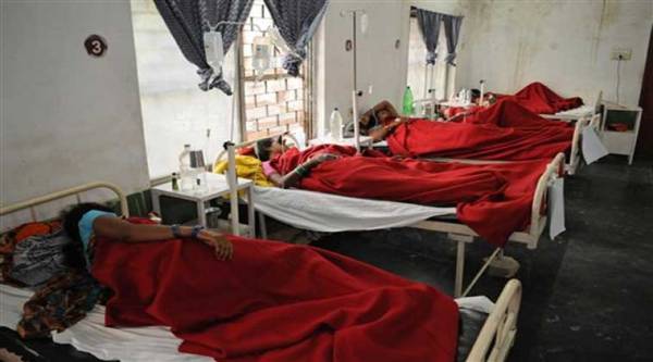 Indian women who underwent sterilization surgeries receive treatment at the District Hospital in Bilaspur, in the central Indian state of Chhattisgarh, Wednesday, Nov. 12, 2014, after at least a dozen died and many others fell ill following similar surgery. (Source: AP)