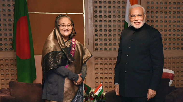 narendra modi, modi in bangladesh, narendra modi bangladesh visit, modi bangaldesh visit, sheikh hasina, sheikh hasina narendra modi, dhaka, narendra modi dhaka, bangladeshi workers, bangladesh news, world news