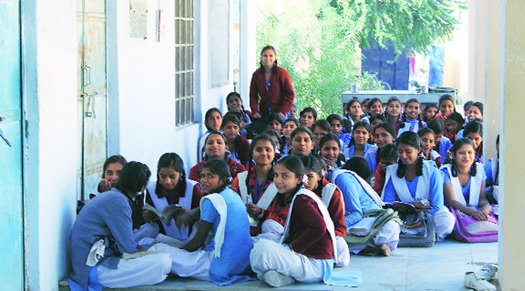 Students wait for a teacher in the school corridor. ( Source: Express photo by Shrenik mutha)