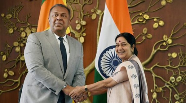 External Affairs Minister Sushma Swaraj shakes hands with Sri Lankan Foreign Minister Mangala Samaraweera in New Delhi on Sunday. (PTI Photo)