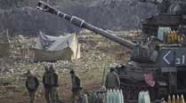 Israel fires at least 35 shells into Lebanon after missile strikes military vehicle