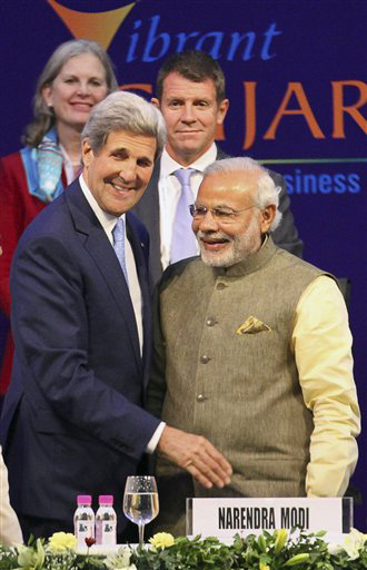 U.S. Secretary of State John Kerry, left, and Indian Prime Minister Narendra Modi attend the Vibrant Gujarat summit in Gandhinagar. (Source: AP)