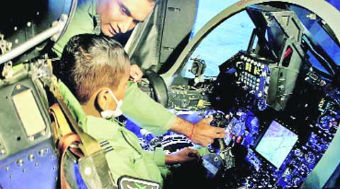 He had a model of Tejas fighter next to him on his bed.