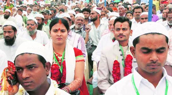Couples at the mass wedding in Ahmedabad on Sunday. (Express photo by Javed Raja)