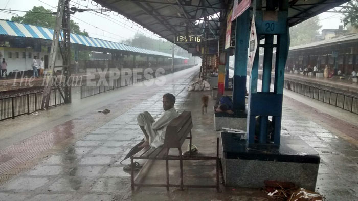 LIVE: Mumbai hit by torrential rains, train services on main line.