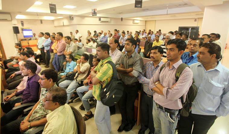 Express staffers listen to the CMD's address at the Mahape office in Navi Mumbai on Friday. (Source: Express photo by Prashant Nadkar)