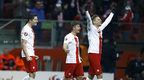 Robert Lewandowski leads Poland to Euro 2016, Germany seal  spot too