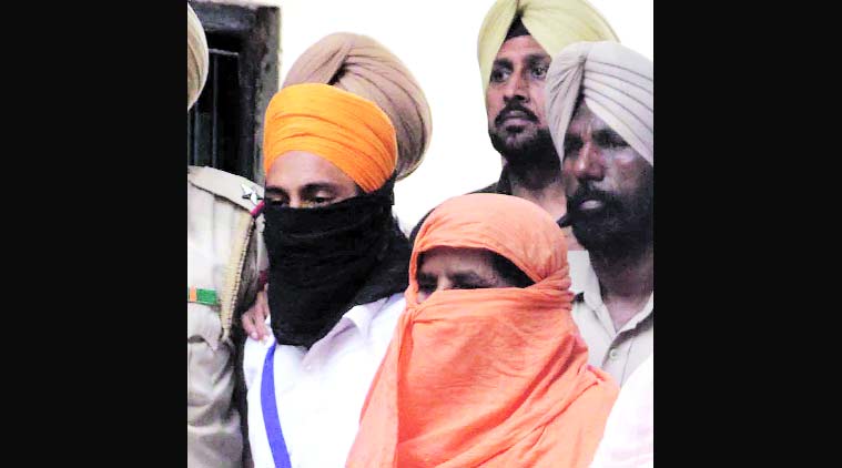 The two suspects in police custody in Ludhiana Monday.  (Gurmeet Singh)