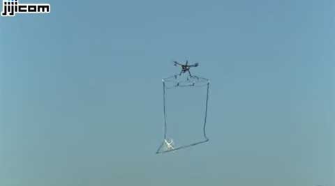 In Japan, police to use large drones with nets to catch other drones