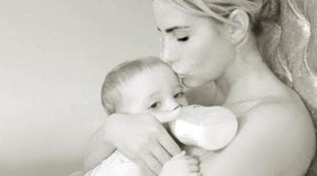 Katie Price poses nude with her 14-month-old baby daughter