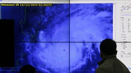 Typhoon Melor weakens but leaves 1 dead as it crosses Philippines