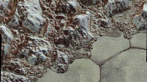 NASA releases new close up of Pluto, now in colour