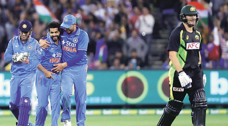 In the 15th over of the Australian innings, Ravindra Jadeja jumped up in a flash to pull off a brilliant catch off his own bowling when a Shane Watson uppish straight drive seemed headed to the boundary. (Below) James Faulkner was out when the ball ricocheted off Dhoni’s pad onto the stumps. (Source: Reuters)