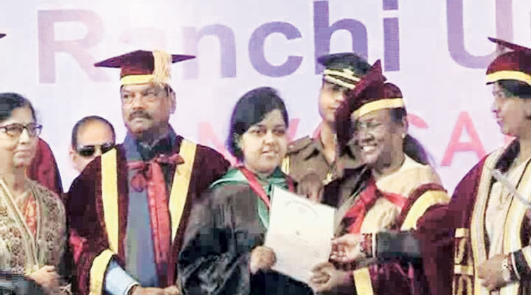 Sweta Mandal receives her masters degree. Express