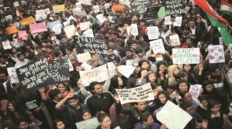 Demonstrators shout slogans as they hold placards during a protest demanding the release of Kanhaiya Kumar, a Jawaharlal Nehru University (JNU) student union leader accused of sedition, in New Delhi on Thursday. (Express photo by Oinam Anand)