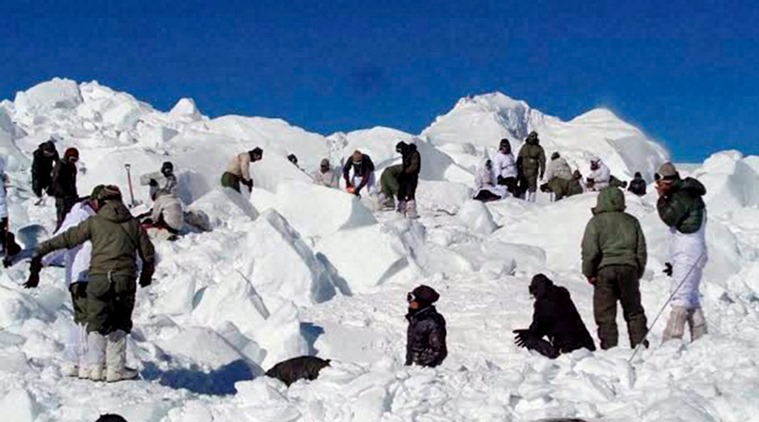 Specialised rescue teams who were carrying out the operations to search for the bodies of the soldiers hit by an avalanche, in Siachen on Tuesday. (PTI Photo)