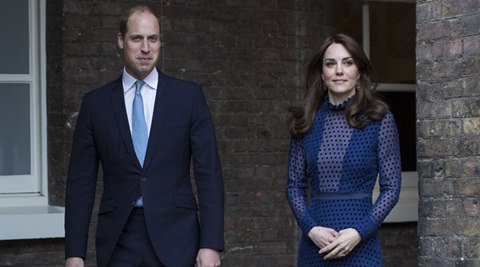 Prince William and Kate, the Duchess of Cambridge, center, attends a reception at Kensington Palace on Wednesday April 6, 2016, ahead of their tour to India and Bhutan. (Warren Allott/Pool via AP)