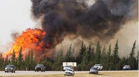 Watch: Canada wildfire may double in size, approaches oil sands project; evacuees urged to go to cities