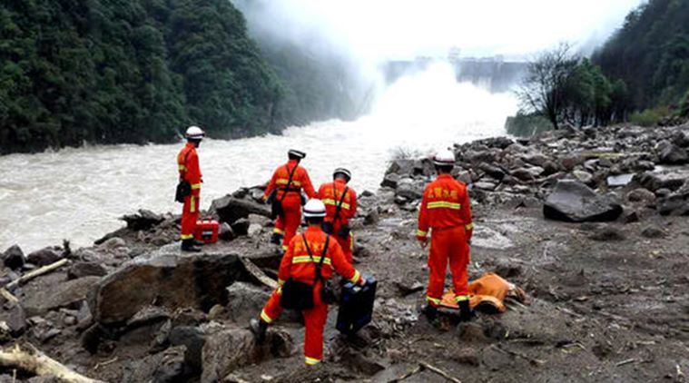 Rescuers search for potential survivors at the site following a landslide in Taining county in southeast China’s Fujian province. (Photo: AP)