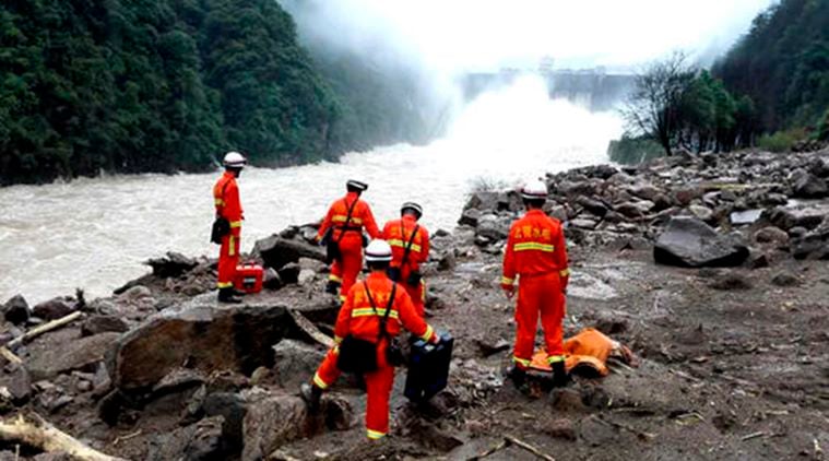 Rescuers search for potential survivors at the site following a landslide in Taining county in southeast China’s Fujian province. (Photo: AP)