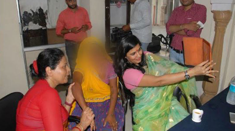 Member of Rajasthan State Commission for Women clicking a selfie with the rape victim/ ANI