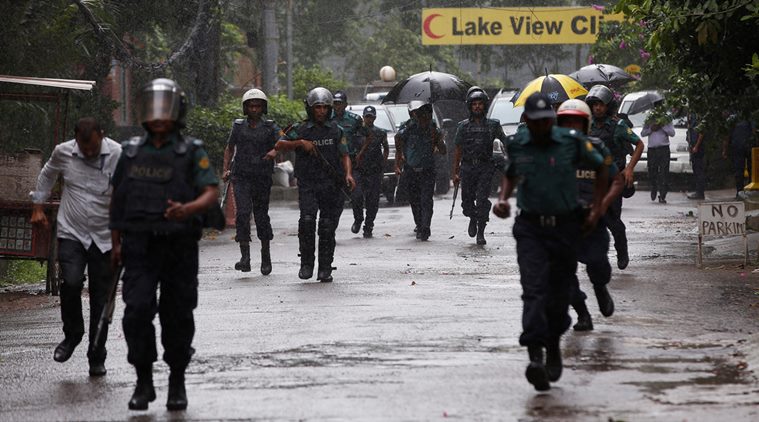 Policemen patrol on the road leading to the Holey Artisan Bakery and the O’Kitchen Restaurant after gunmen attacked, in Dhaka, Bangladesh, July 3, 2016