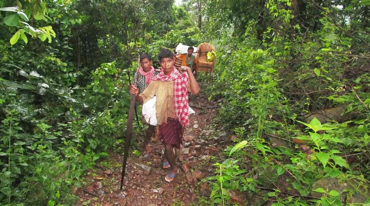 the long trek to Nagada village, which a few officials only recently made after reports emerged of the deaths. Debabrata Mohanty