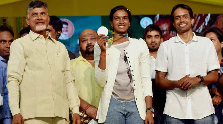 Image result for pv sindhu and gopichand with CMs
