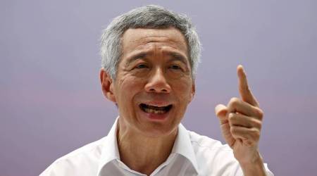 Singapore PM Lee Hsien Loong’s siblings accuse him of abusing power, threaten to go to court