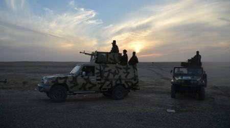 Iraqi forces capture border crossing to Syria from Islamic State