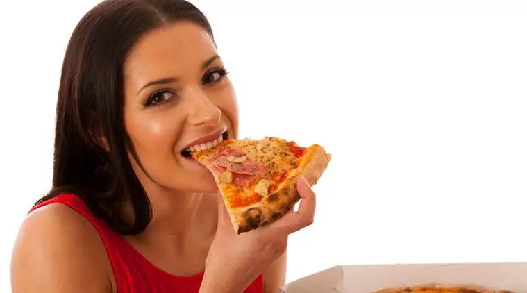 Pizaa, pizza italy, pizza naples, pizza eating ways, pizza eating right way, pizza eating wrong way,. pizza eating wallet technique, traditional pizza eating way, pizza folding and eating way, food news, lifestyle news, latest news, indian express