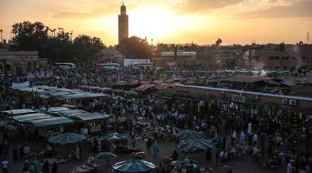 People gather in the landmark Jemaa el-Fnaa square, in Marrakesh, Morocco, Saturday, Nov. 5, 2016. The Climate Conference, known as the COP22, starts Monday in Marrakech and is expected to attract hundreds of participants and state representatives. (AP Photo/Mosa'ab Elshamy)