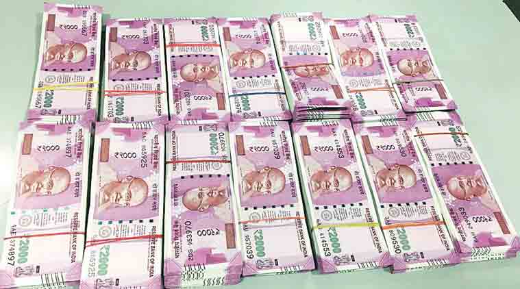 karnataka, karnataka cash seized, latest cash seizure, enforcement directorate, ED, ED raid karnataka, new currency seized, bank managers corruption, demonetisation, narendra modi, bank manager black money, illegal currency exchange, new notes exchange illegal