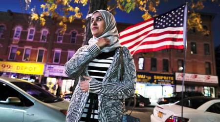 United States Muslims see friendly neighbors, but a foe in White House, says Pew Research Center report