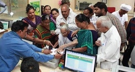 PM Modi’s 96-year-old mother exchanges currency notes at Ahmedabad bank