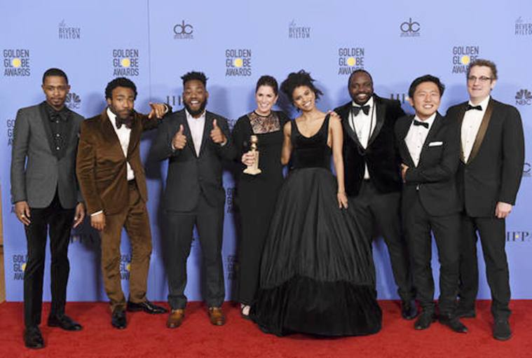 The cast and crew of "Atlanta" poses in the press room with the award for best television series - musical or comedy at the 74th annual Golden Globe Awards at the Beverly Hilton Hotel on Sunday, Jan. 8, 2017, in Beverly Hills, Calif. (Photo by Jordan Strauss/Invision/AP)